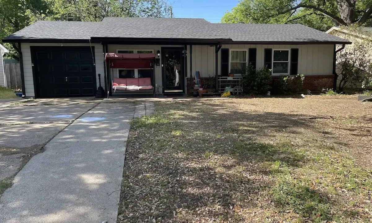 Asphalt Shingle Roof Repair crew at work on a residential roof in Ocala